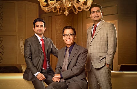 From Left: Ramesh Kalyanaraman, Executive Director, KalyanJewellers, T. S. Kalyanaraman Iyer, chairman and managing director of Kalyan Jewellers and Rajesh Kalyanaraman, Executive Director, Kalyan Jewellers.