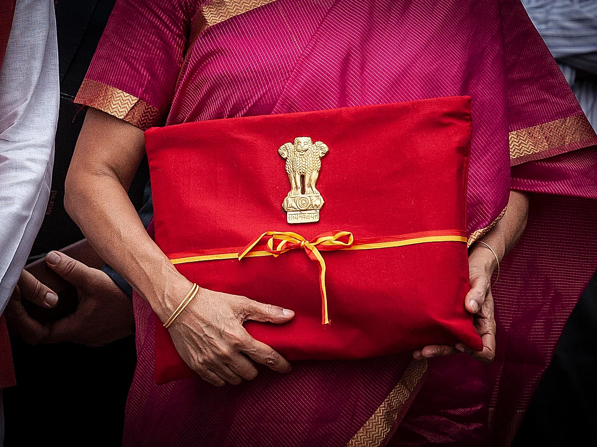 Finance Minister Nirmala Sitharaman replaced the briefcase with a ‘<i>bahi-khata</i>’ with the National Emblem.