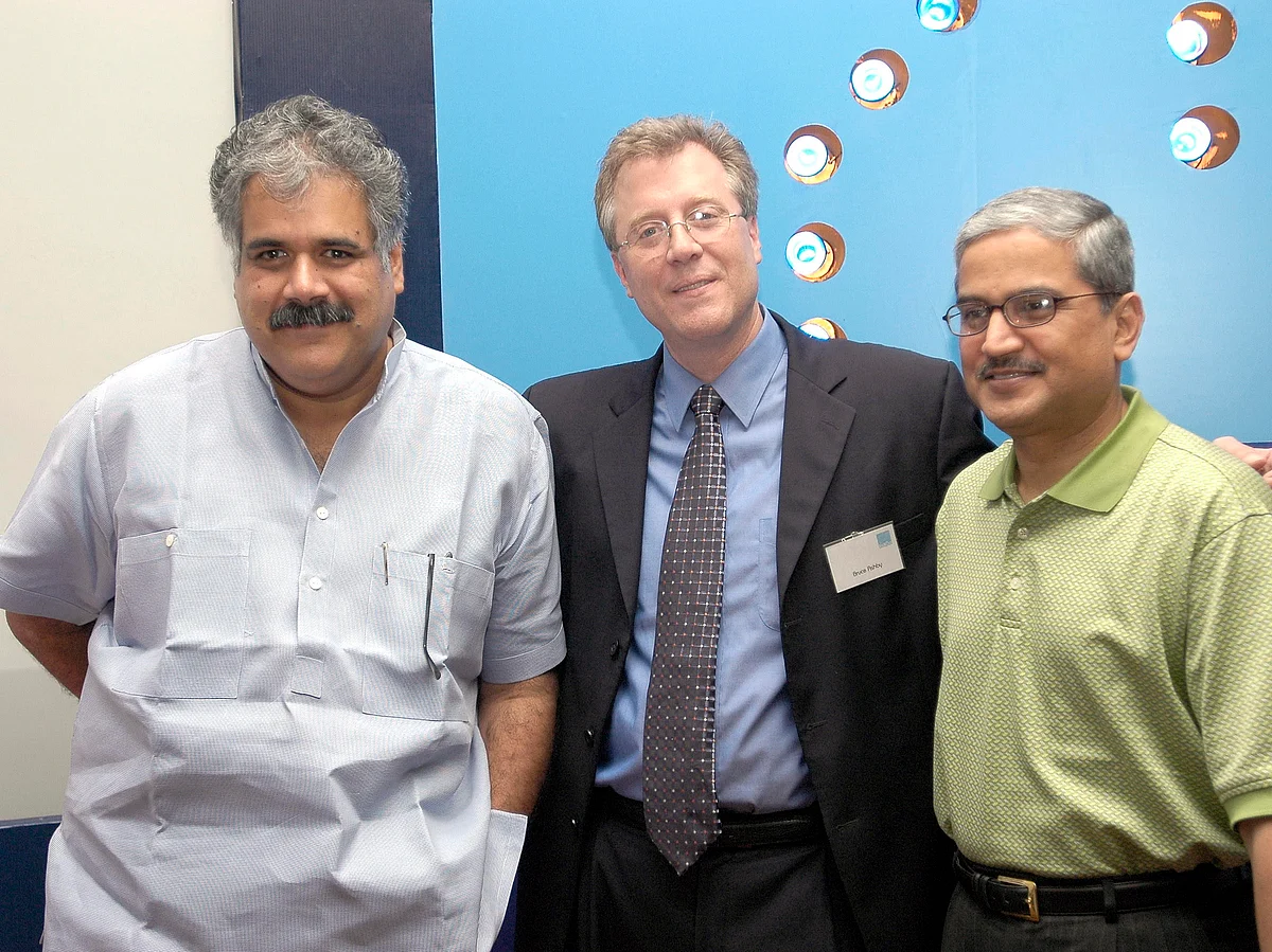 Bruce Ashby (C), former president and CEO, IndiGo Airlines, and co-founders Rahul Bhatia (L) and Rakesh Gangwal at a press conference in New Delhi on July 31, 2006.