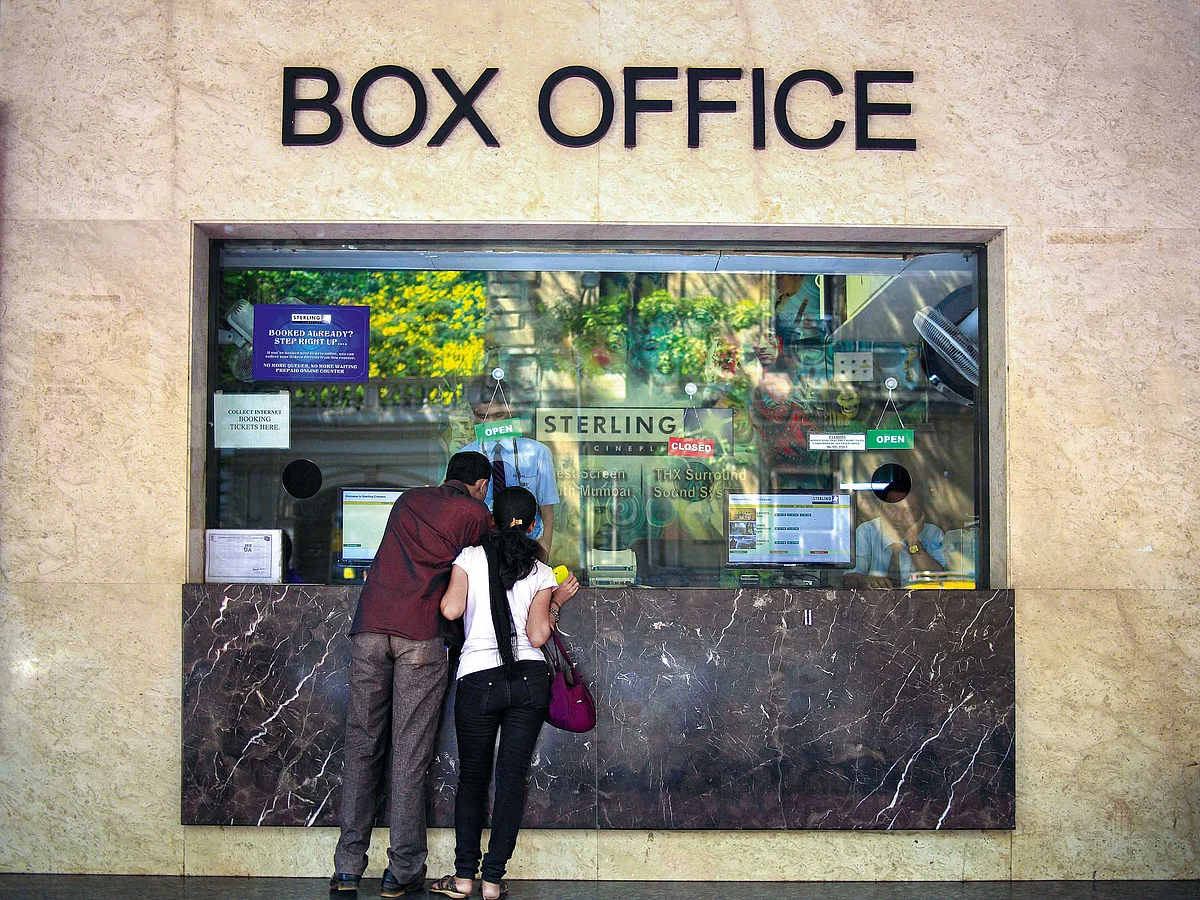 Patrons buying movie tickets at the Sterling Cinema in Mumbai. 