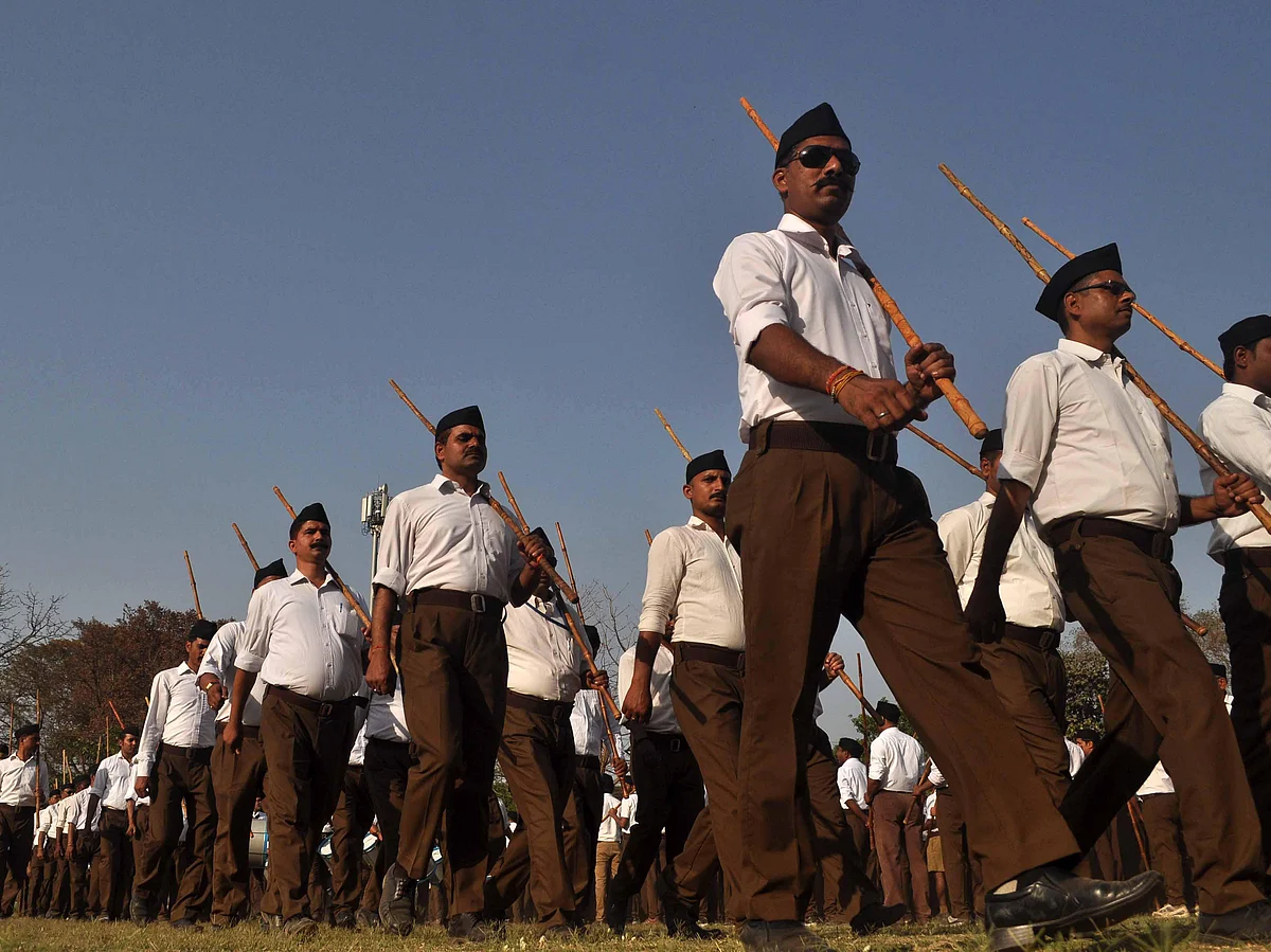 RSS workers take part in <i>Path Sanchalan</i> ahead of Hindu New year celebration in Allahabad.
