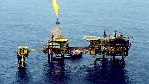 Gas flame on offshore oil platform burning off waste gas