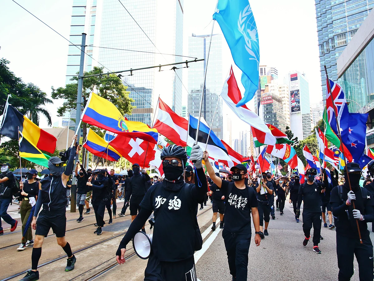Thousands of pro-democracy protesters march through several districts of Hong Kong at the 70th anniversary of China’s National Day. on Oct. 1. Here protesters are seen in an unauthorised march from Causeway Bay to Central.