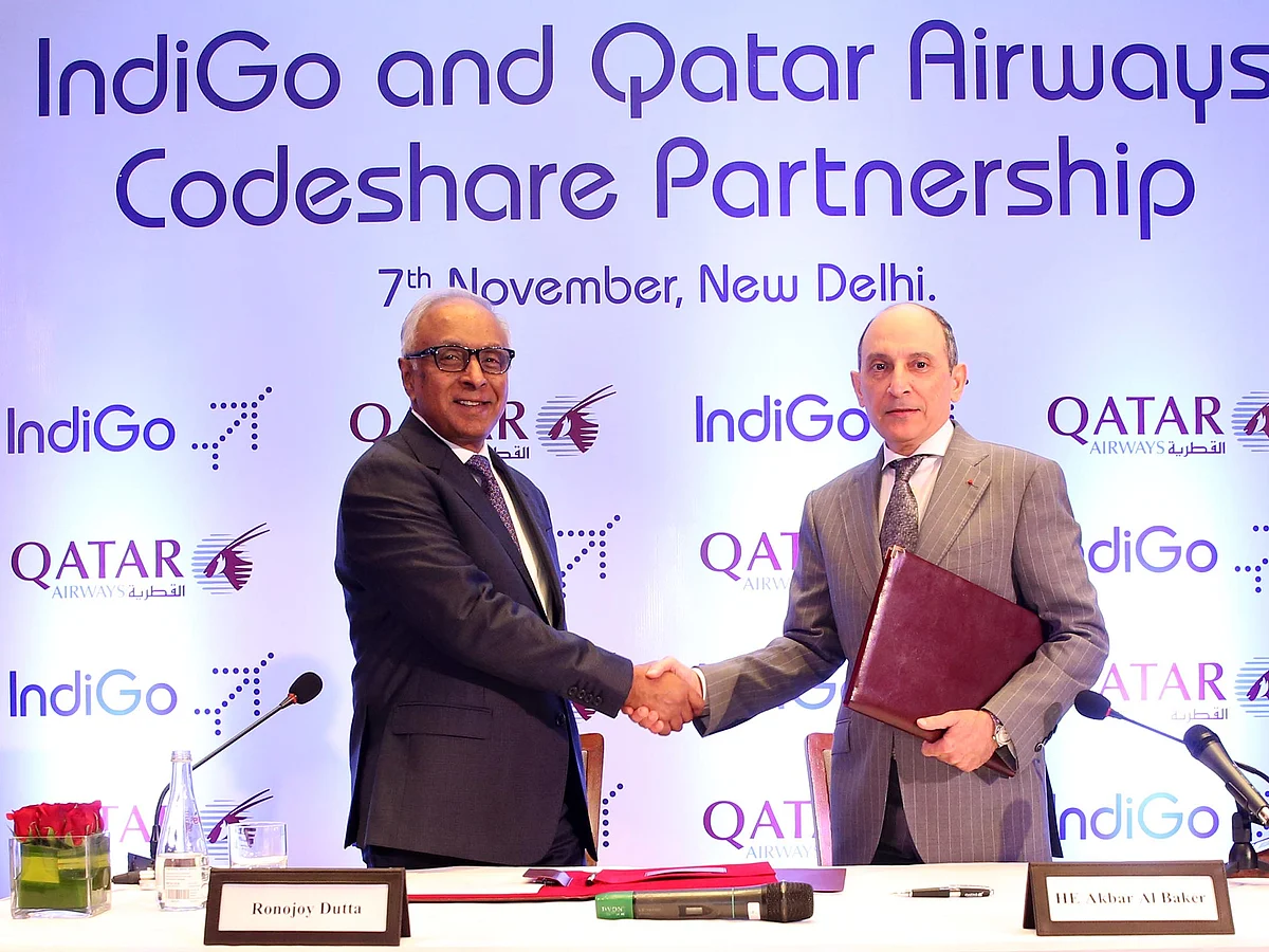 Qatar Airways Group CEO Akbar Al Baker [right] with Indigo CEO Ronojoy Dutta during the signing of the codeshare agreement in New Delhi.