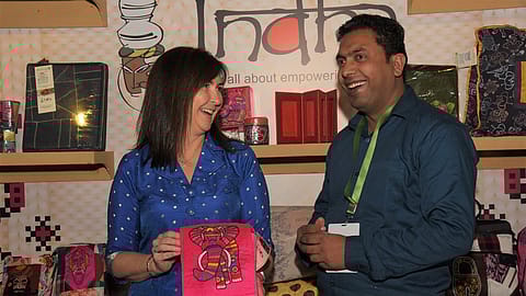 Judith McKenna, President & CEO, Walmart International interacting with a seller at the launch of the Walmart Vriddhi Supplier Development Program. 