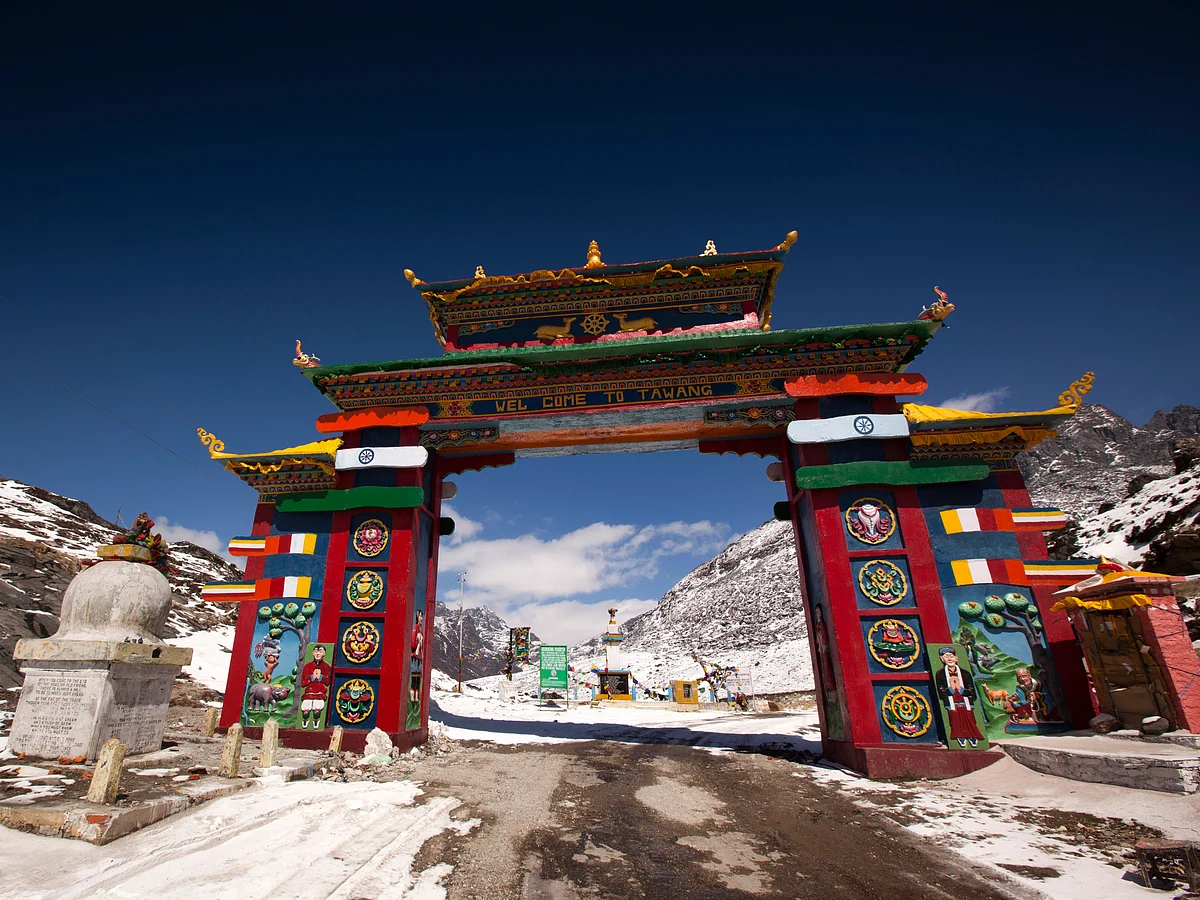 Arunachal Pradesh, Sela Pass, high altitude road passing under colourful gateway to Tawang.