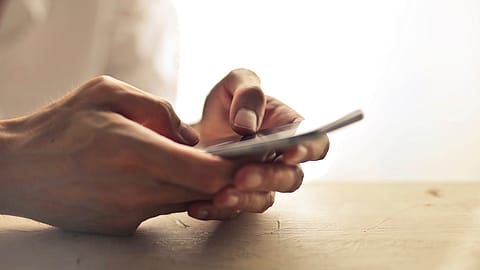 <a href="https://www.pexels.com/@adrienn-638530?utm_content=attributionCopyText&utm_medium=referral&utm_source=pexels">Adrienn</a> from <a href="https://www.pexels.com/photo/person-using-smartphone-1458283/?utm_content=attributionCopyText&utm_medium=referral&utm_source=pexels">Pexels</a>