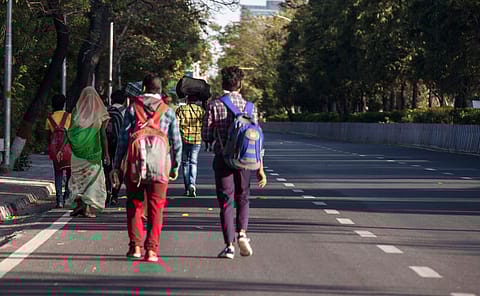 Migrant workers, desperate for survival, walk hundreds of kilometres to their villages after the lockdown is announced. The government will have to find ways to provide greater support to the underprivileged.