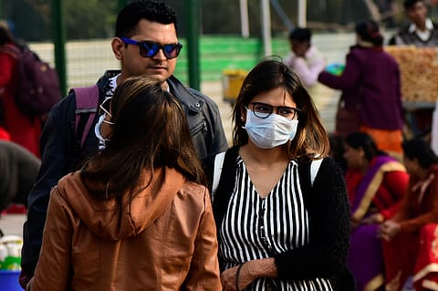 People in the street wear masks amid fears of spread of the novel coronavirus in New Delhi. Indian authorities have placed several citizens under medical observation and screened thousands of passengers, in addition to issuing travel and health advice. India’s first confirmed case of coronavirus was reported in Kerala on 30 January, with the patient being a female student from Wuhan University.