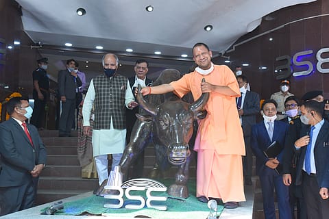 Catching the bull by the horns: Yogi Adityanath, Chief Minister Of Uttar Pradesh, at the Bombay Stock Exchange for the listing ceremony of Lucknow Municipal Corporation Bonds.