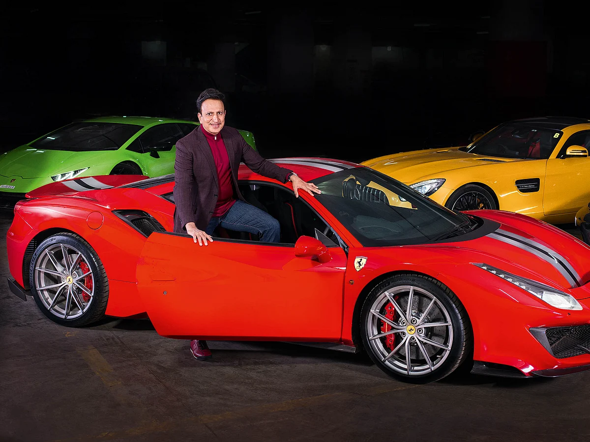 Dinesh Thakkar, Chairman and MD of Angel Broking, with his cars.