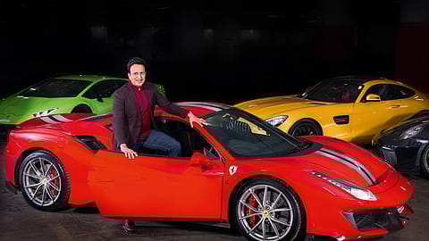 Dinesh Thakkar, Chairman and MD of Angel Broking, with his cars.
