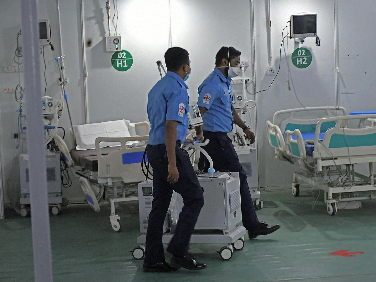 COVID-19 care center at Delhi Cantt by DRDO, Indian Army, Indian Navy, and Indian Air Force getting the red room prepared for the treatment of patients.