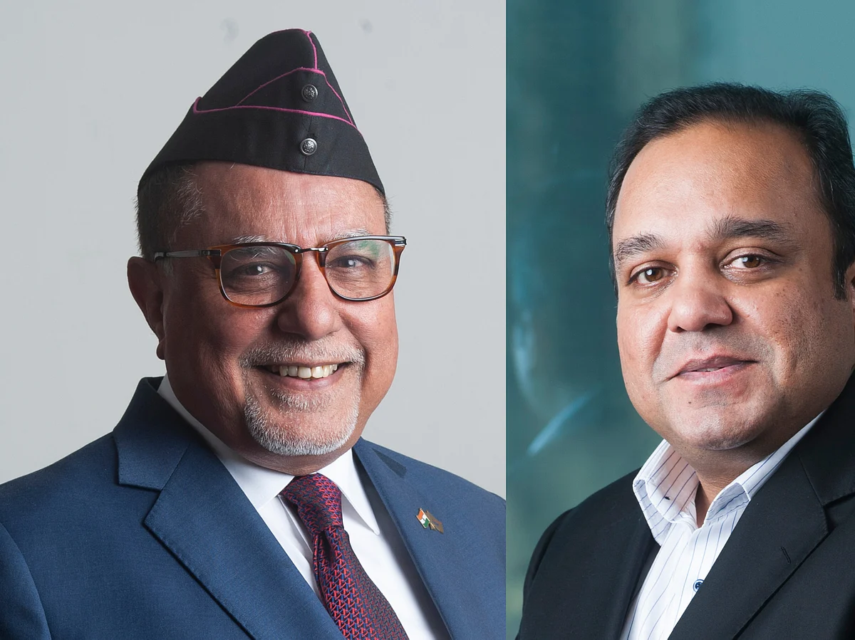 Zee founder Subhash Chandra (left) and his son Punit Goenka.