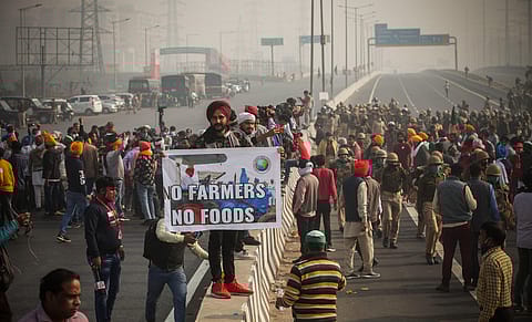 Farmers staging a demonstration against the three farm laws at the Ghazipur border in New Delhi.