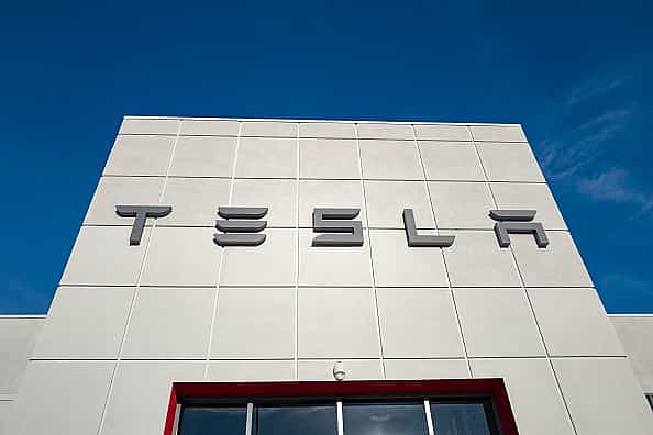 Tesla forecasts 50% growth but chip shortage will hurt deliveries in 2022
