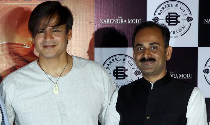 PM Narendra Modi co-producer Manish Grover with actor Vivek Oberoi