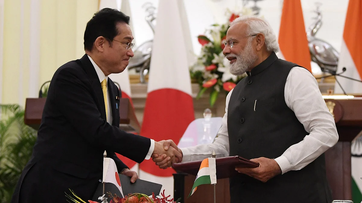 PM Modi and Japanese PM Kishida Fumio exchange an MoU during the India-Japan Economic Forum, at Hyderabad House, in New Delhi on March 19, 2022.