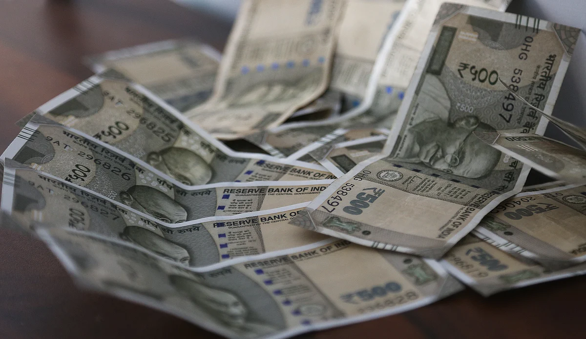 The Indian rupee fell to 77.69 amid negative cues from the global markets and dismal economic outlook back home.