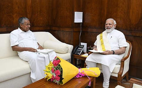 Prime Minister Narendra Modi and Kerala chief minister Pinarayi Vijayan 