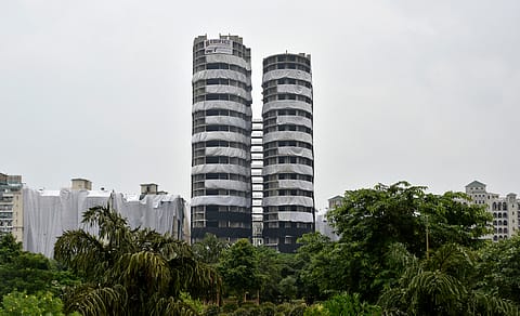 The twin towers will be razed after a 12-year legal battle between a group of senior citizens and Supertech.