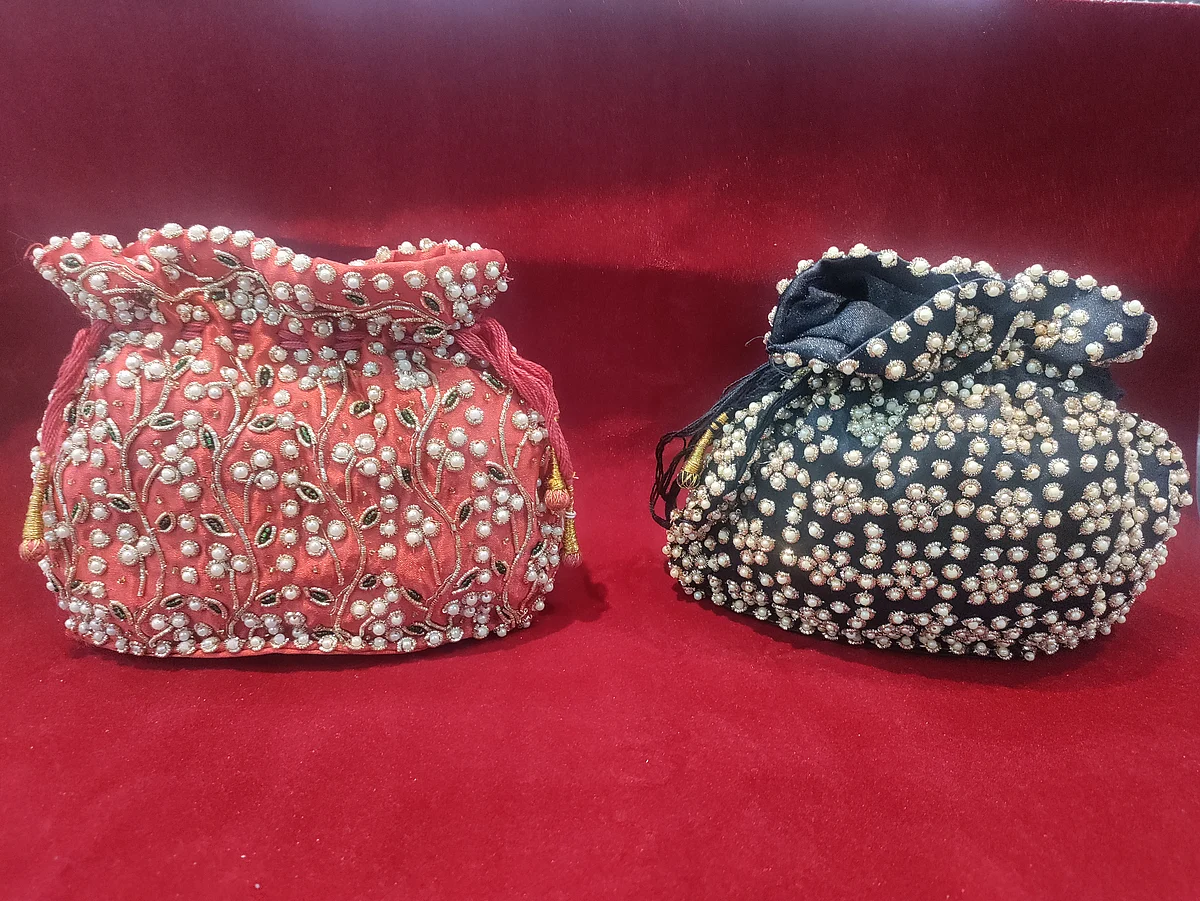 The muti-hued, batua made in velvet with two sets of strings -- one for opening and the other for closing -- was originally used in the Nawab era to carry paan, laung supari, gutka and small currency.