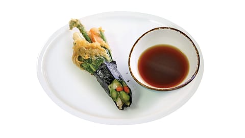 Tempura of spring vegetables and mushrooms with roasted aliums and jus, by chef Rupert Blease.