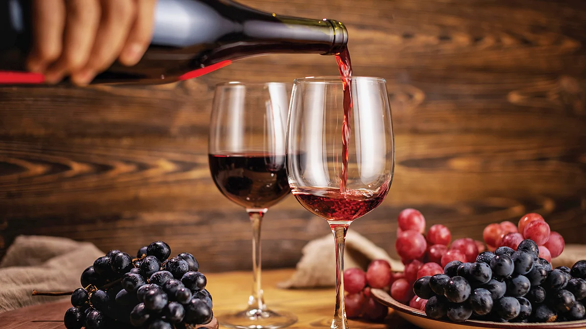 Georgian wine is fermented from the whole grape (grape juice, skin, stalks, pips, et al) in beeswax-lined terracotta urns called qvevri.