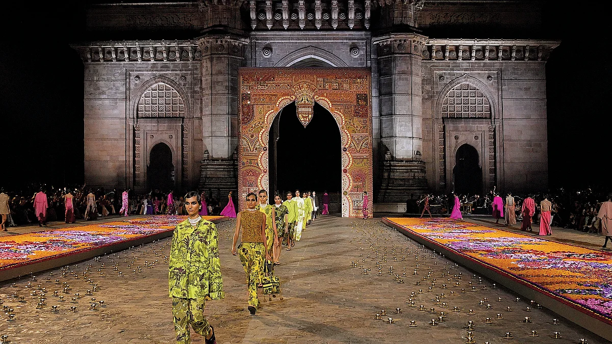 Models on the runway at Dior 
Pre-Fall 2023 Fashion Show in Mumbai.