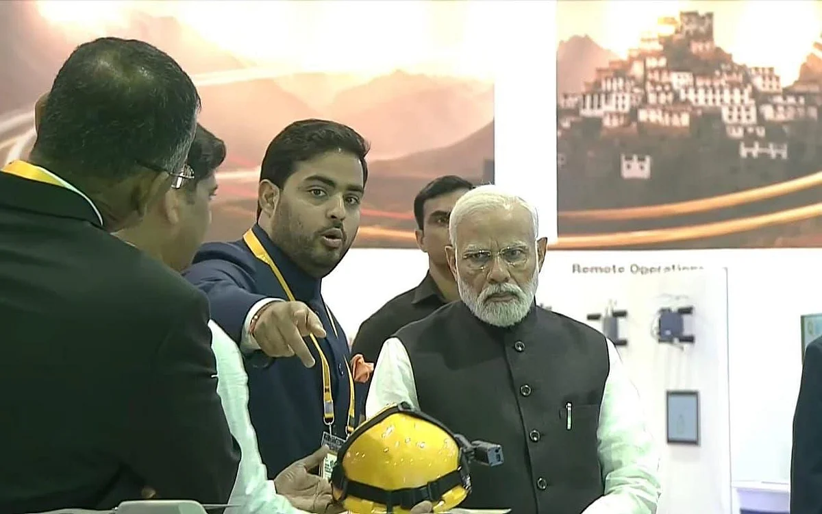 Reliance Jio chairman Akash Ambani with Prime Minister Narendra Modi at the India Mobile Congress 2023 in New Delhi on Friday.