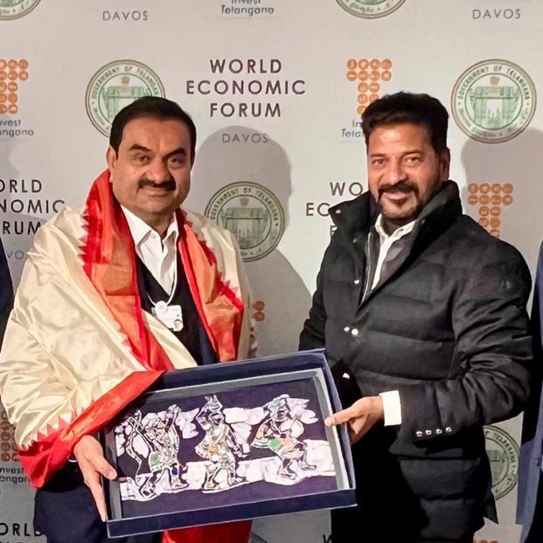 Adani Group chairman Gautam Adani and Telangana CM Revanth Reddy

