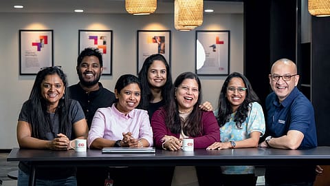 Sarika Pradhan (third from right) with employees at the company’s Bengaluru office; Future-ready Workplaces, CGI India, #6