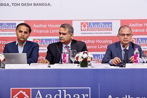 Top officials of Aadhar Housing Finance at IPO conference in Mumbai