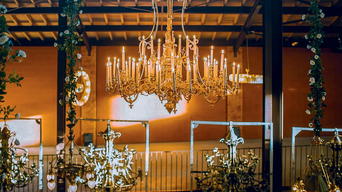 Régis’ chandeliers hang in the Palace of Versailles in France.