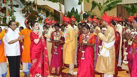 Nita Ambani and Mukesh Ambani, along with their family, attended the ceremony and personally extended best wishes to the couples.