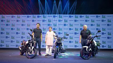 Bajaj Auto managing director Rajiv Bajaj (left) with Union minister Nitin Gadkari at the launch of CNG motorcycle Freedom.