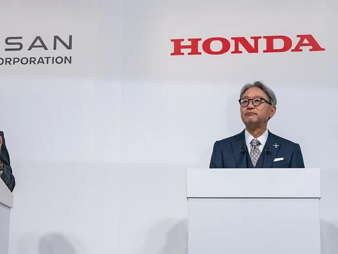 The two Japanese carmakers officially started merger discussions on Monday.