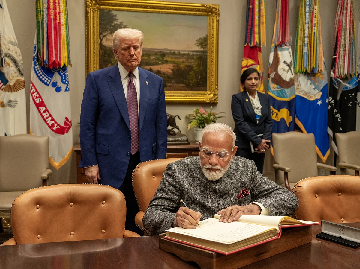 Prime Minister Narendra Modi (seated) with U.S. President Donald Trump.