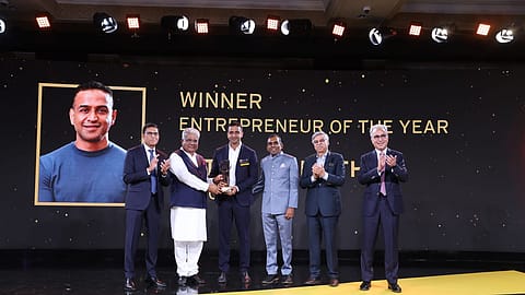 Zerodha founder and CEO Nithin Kamath (third from left) receiving the EY Entrepreneur Of The Year award.