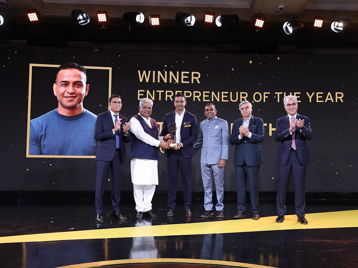Zerodha founder and CEO Nithin Kamath (third from left) receiving the EY Entrepreneur Of The Year award.