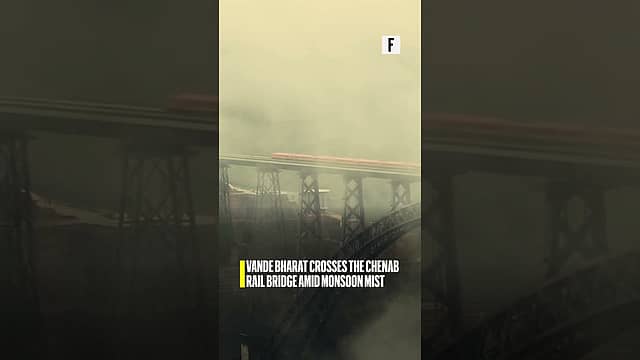Vande Bharat crosses the Chenab Rail Bridge amid monsoon mist