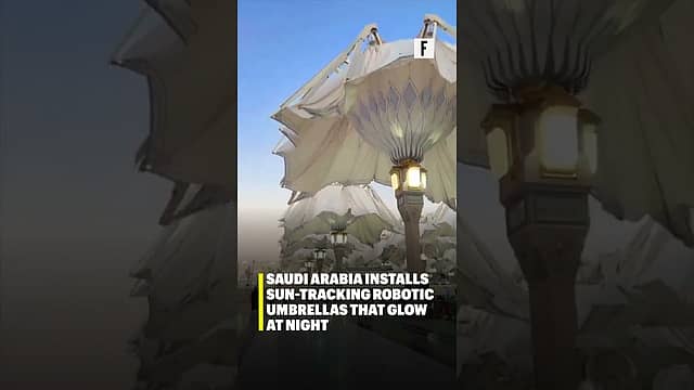 Saudi Arabia installs sun-tracking robotic umbrellas that glow at night