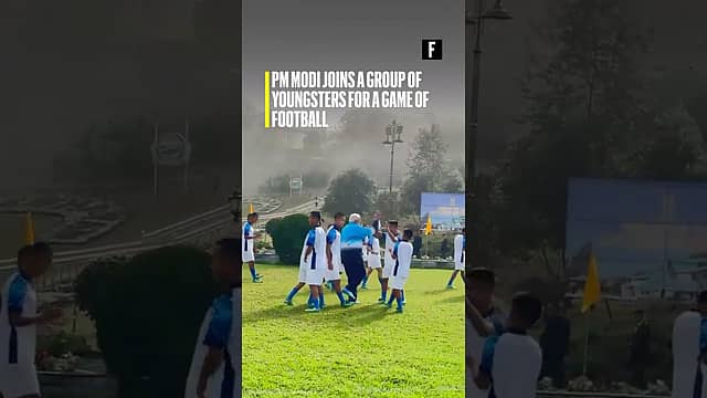 PM Modi joins a group of youngsters for a game of football