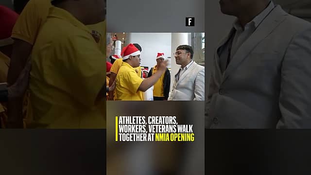 Athletes, creators, workers, veterans walk together at NMIA opening